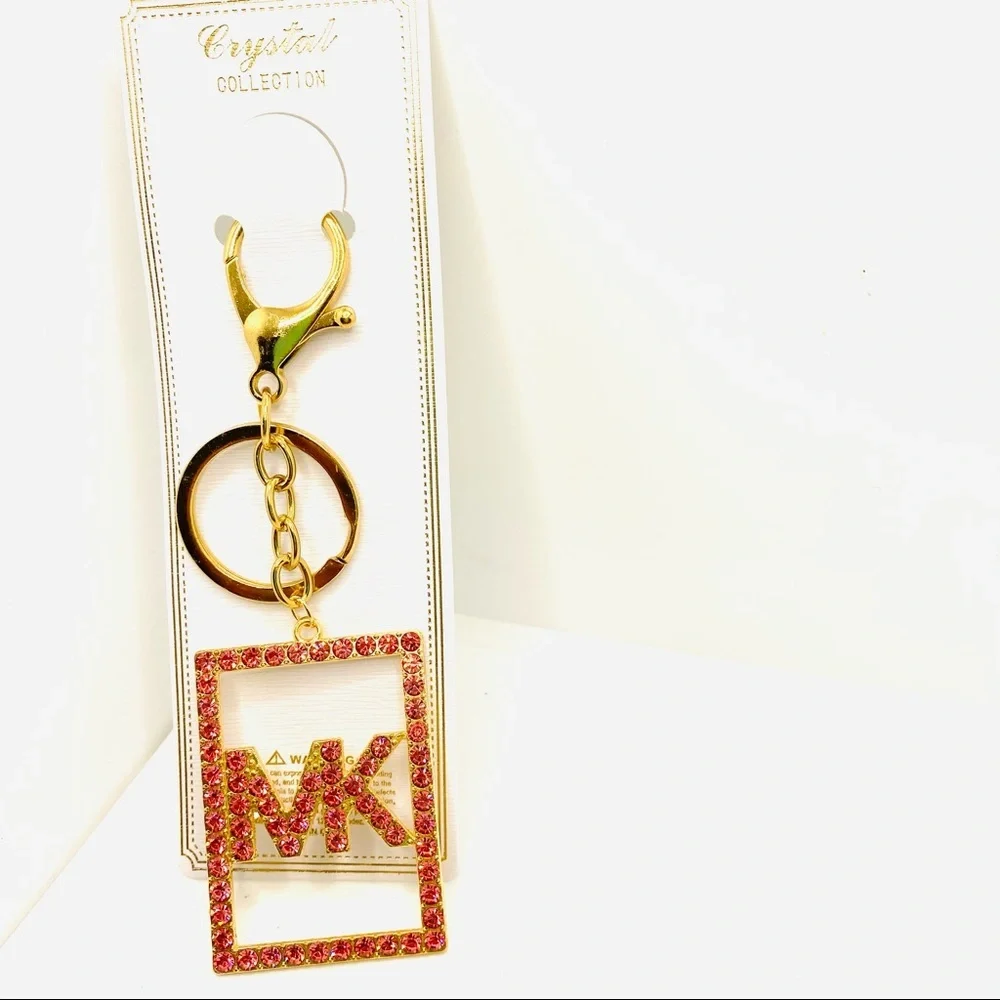 Purse Charm Key Chain MK Pink Crystals set in golden tone. BRAND NEW